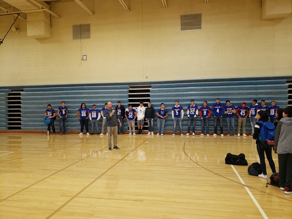 HHS Football team at HMS Fight song Friday